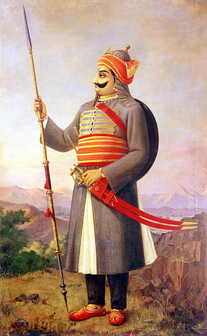 Portrait of Maharaja Ranjit Singh in traditional attire holding a spear and sword against a mountainous landscape HD phone wallpaper