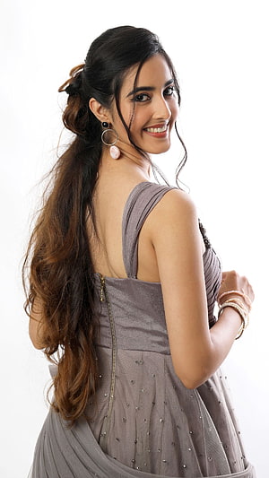 Simrat Kaur in Elegant Grey Saree with Flowing Hair and Statement Earrings HD phone wallpaper
