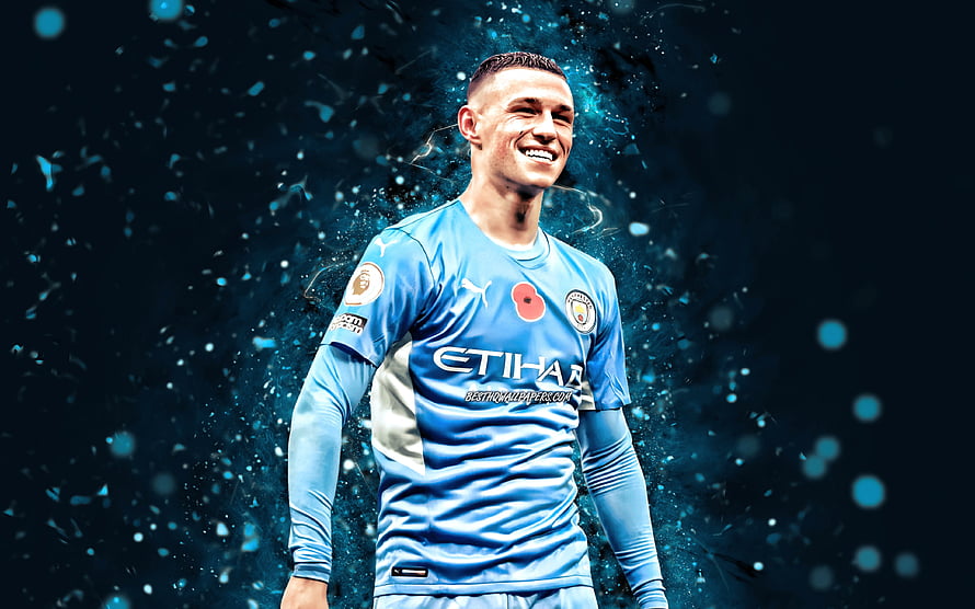 Phil Foden in Manchester City Sky Blue Kit with Dynamic Particle Effects HD wallpaper