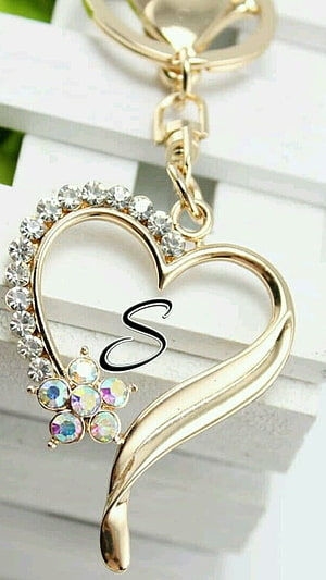 Gold Heart Locket Keychain with Crystal Flower and Initial S HD phone wallpaper