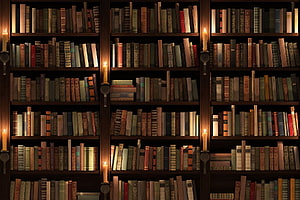 Vintage Library Bookshelves With Candles And Antique Leather Books HD wallpaper