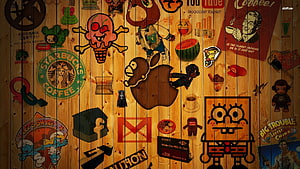 Apple Logo Sticker Collage on Rustic Wooden Panel with Pop Culture Icons HD wallpaper