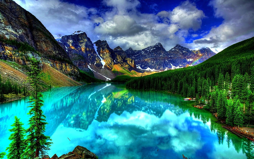 Turquoise Mountain Lake Reflecting Snow-Capped Peaks and Dense Evergreen Forest HD wallpaper