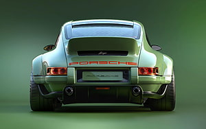 Rear View of a Classic Green Porsche 911 with Wide Body Kit and Dual Exhaust HD wallpaper
