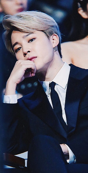 Jimin BTS in a formal black suit with platinum blonde hair at an awards ceremony HD phone wallpaper