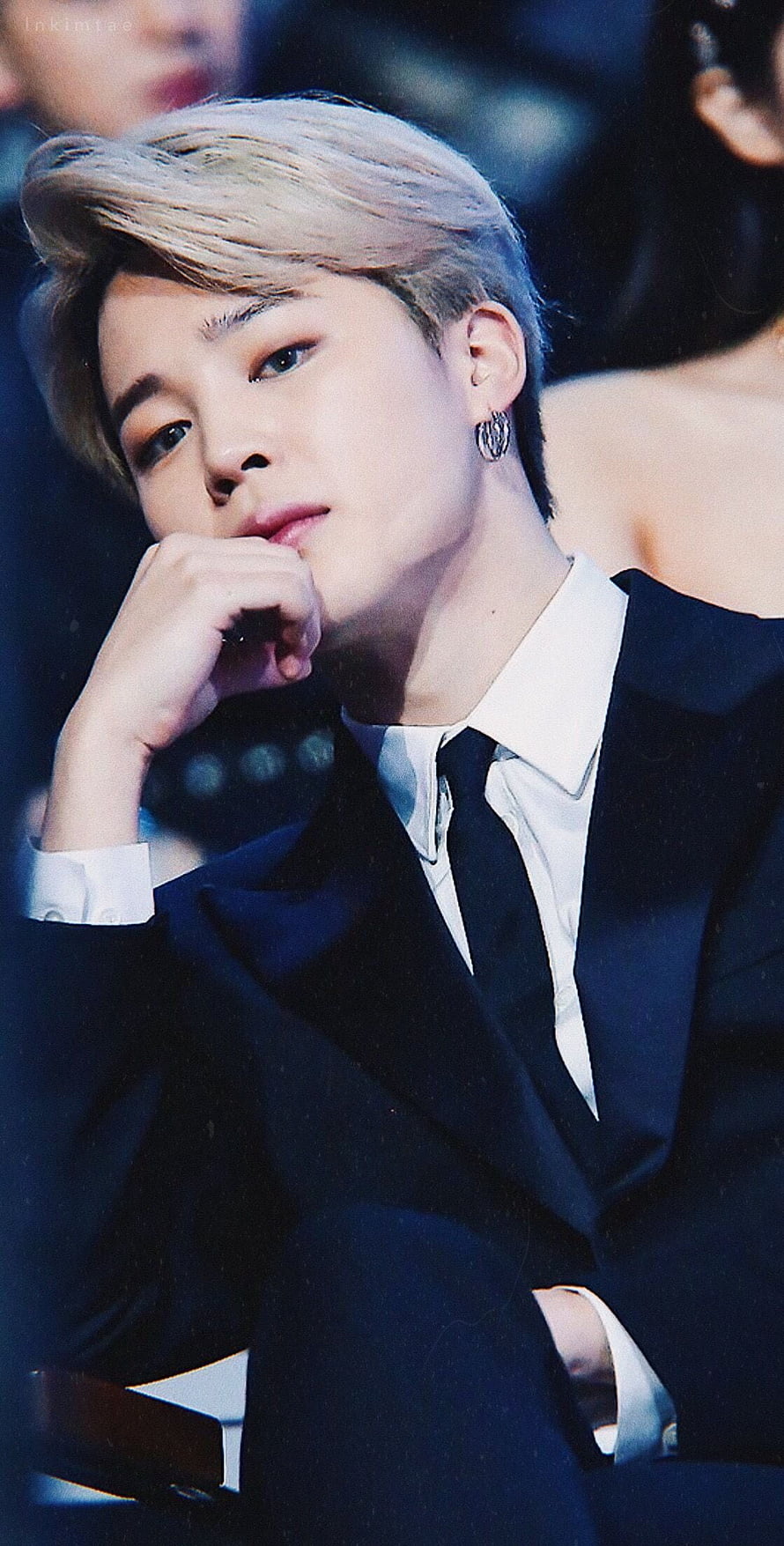 Jimin BTS in a formal black suit with platinum blonde hair at an awards ceremony HD phone wallpaper