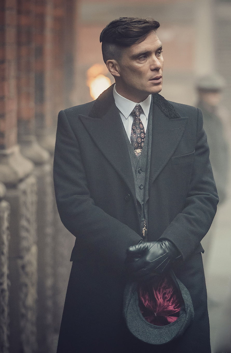 Thomas Shelby from Peaky Blinders in a dark coat holding a hat HD phone wallpaper
