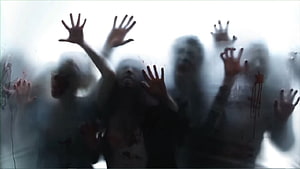 Horror Wallpaper Featuring Silhouettes of Zombies Pressing Hands Against Frosted Glass HD wallpaper