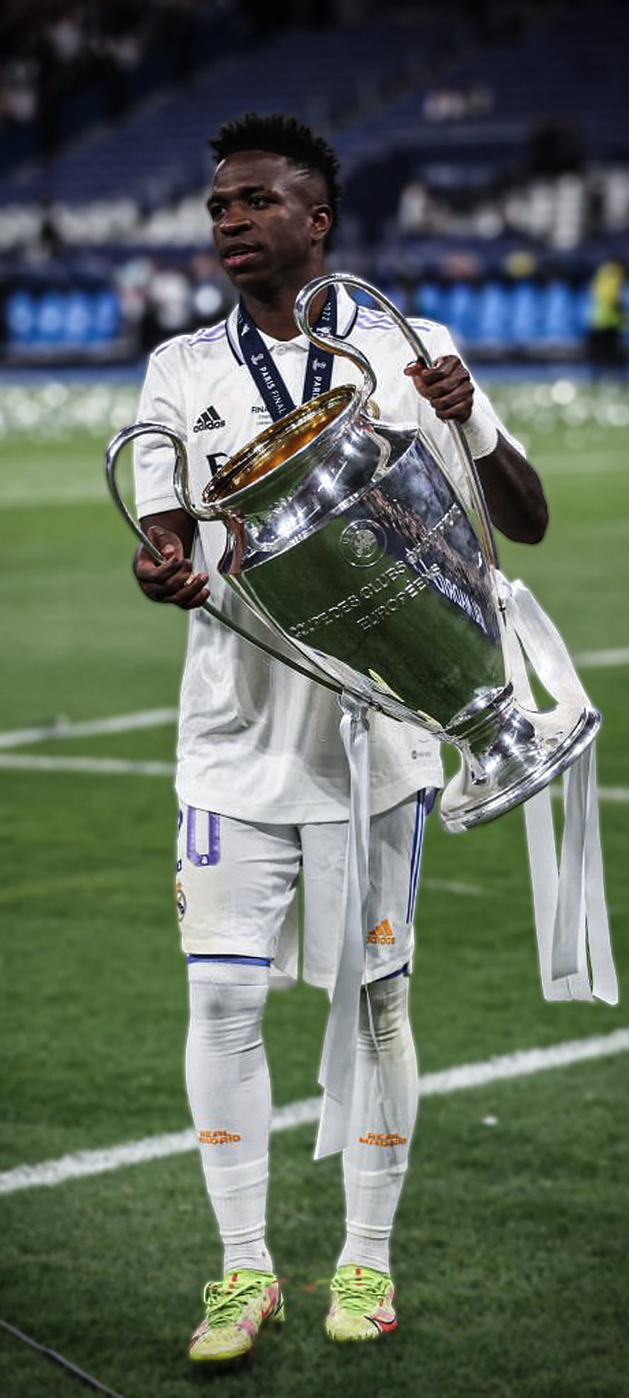 Vinicius Jr. Holding the Champions League Trophy in Real Madrid Kit HD phone wallpaper