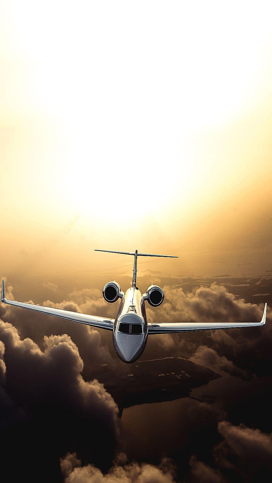 Luxury Private Jet Cruising Above Golden Clouds at Sunset HD phone wallpaper