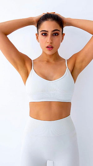 Sara Ali Khan in White Athletic Sportswear with Hands Behind Head HD phone wallpaper