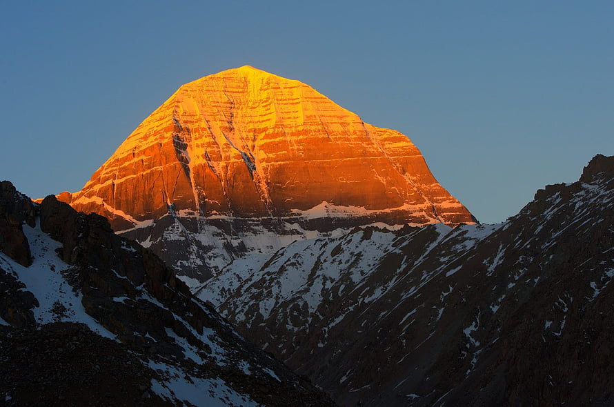 Golden Sunrise Illuminating the Sacred Peak of Mount Kailash in the Himalayas HD wallpaper