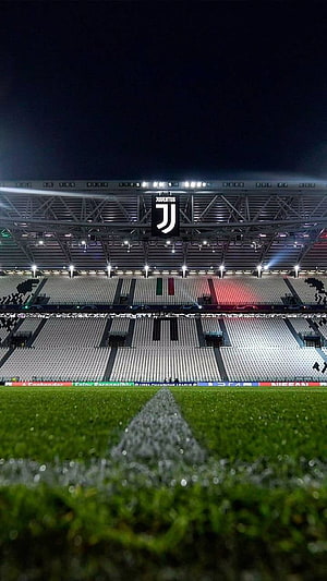 Juventus Stadium Night View with Pitch and Empty Seating HD phone wallpaper