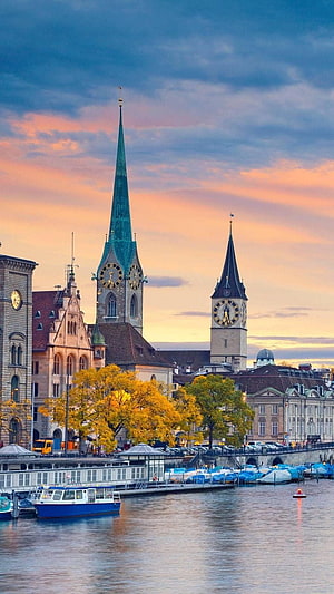 Zurich Old Town Skyline at Sunset with Limmat River and Historic Church Spires HD phone wallpaper