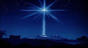 Star of Bethlehem shining over the manger scene at night with a deep blue starry sky HD wallpaper