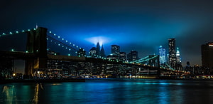Brooklyn Bridge and Manhattan Skyline at Night with Blue Illumination HD wallpaper
