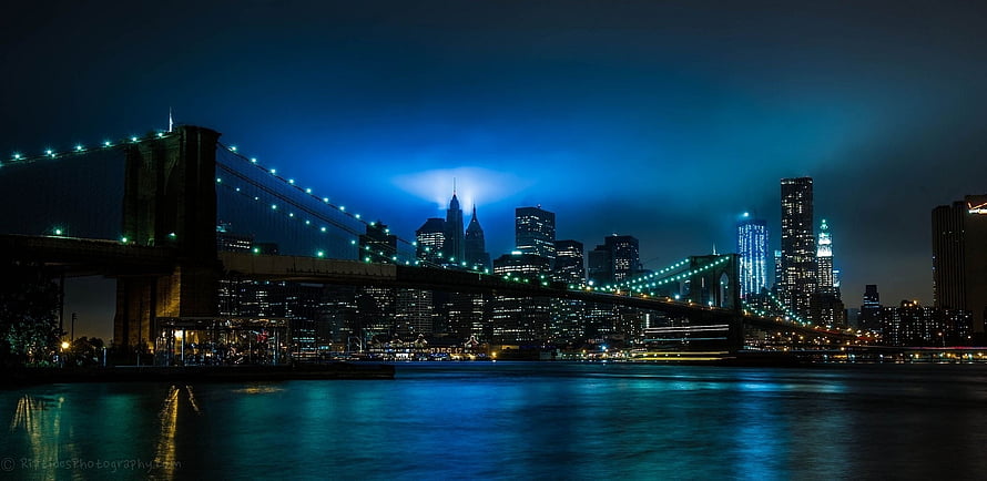 Brooklyn Bridge and Manhattan Skyline at Night with Blue Illumination HD wallpaper