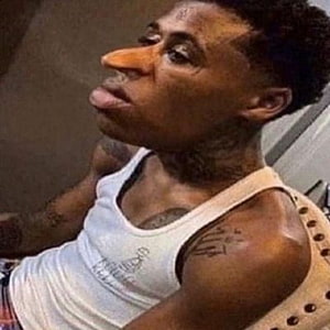 Funny distorted face meme of a man with a long nose and tongue sticking out in a white tank top, Quandale Dingle, jaw, active_tank HD phone wallpaper