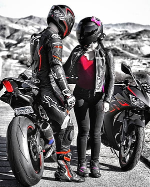 Biker Couple in Alpinestars Gear with Yamaha Motorcycles in Desert Landscape HD phone wallpaper