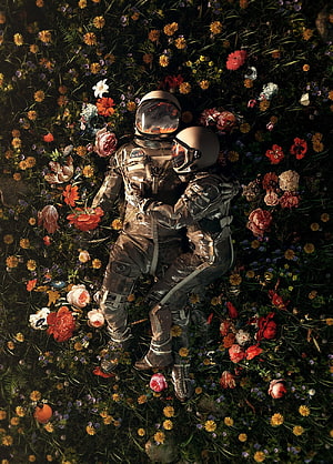Two Astronauts Embracing in a Lush Wildflower Field HD phone wallpaper
