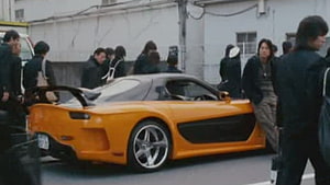 VeilSide Mazda RX-7 in Tokyo Drift with Han and street crowd HD wallpaper
