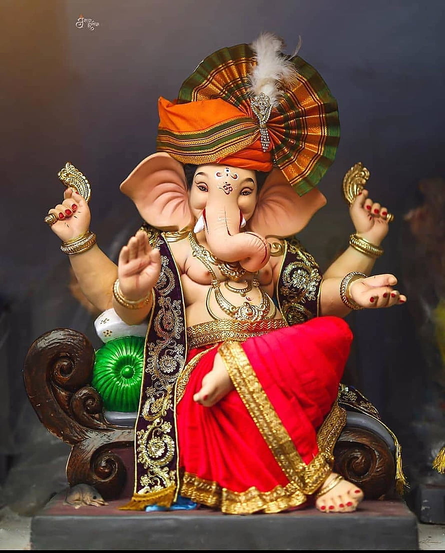 Ganesha Idol Wearing Orange Turban and Red Dhoti with Gold Jewelry HD phone wallpaper