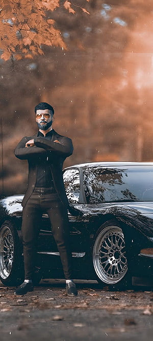 Stylish Man in Black Suit Standing Beside Classic Black Sports Car in Autumn, Pubg mobile, gaming, games, attitude, bgmi, pubg HD phone wallpaper