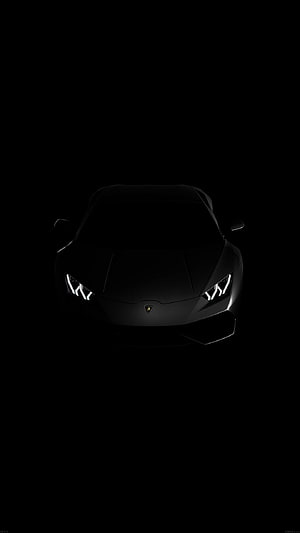 Lamborghini Huracan Front View in Dark Atmosphere with Glowing Headlights HD phone wallpaper