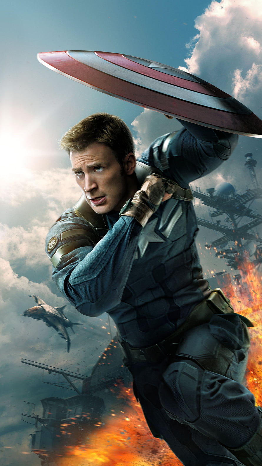Captain America Steve Rogers Throwing Shield in Action Movie Scene HD phone wallpaper