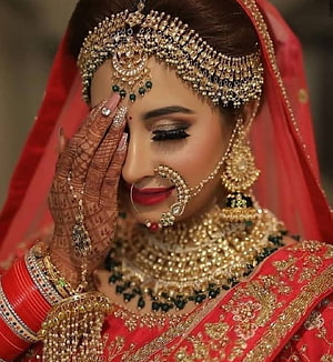 Indian Bridal Portrait With Red Saree, Henna Hands, And Gold Jewelry HD phone wallpaper