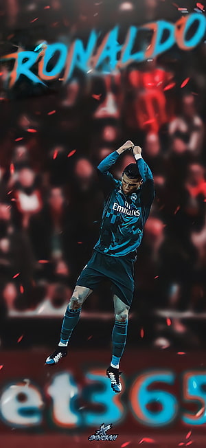 Cristiano Ronaldo in Real Madrid Blue Kit Celebrating Goal with Dynamic Pose HD phone wallpaper