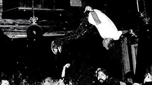 Playboi Carti mid-air crowd surfing at a high-energy live concert HD wallpaper