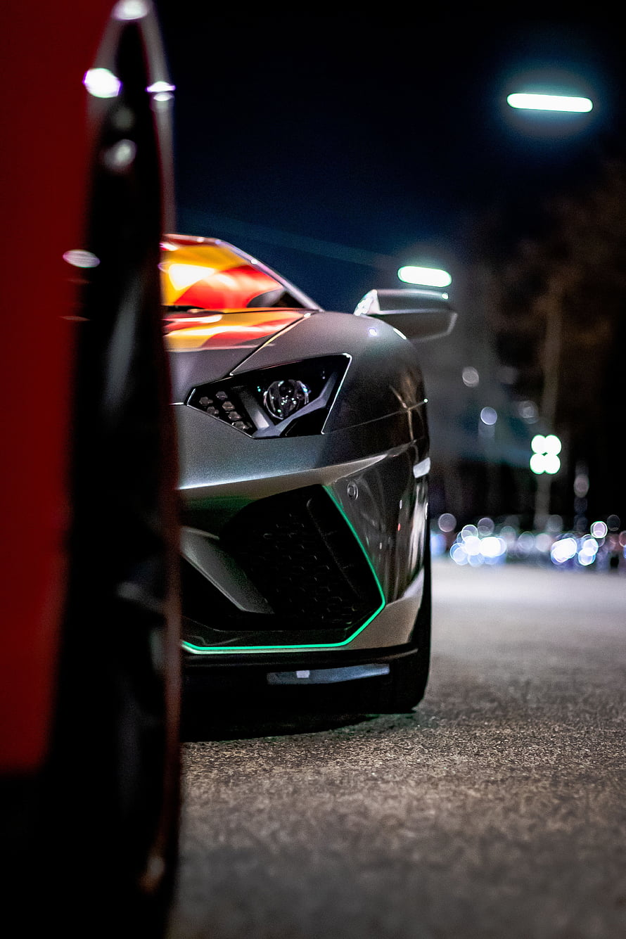 Matte Grey Lamborghini Aventador Front View at Night with Green Underglow HD phone wallpaper