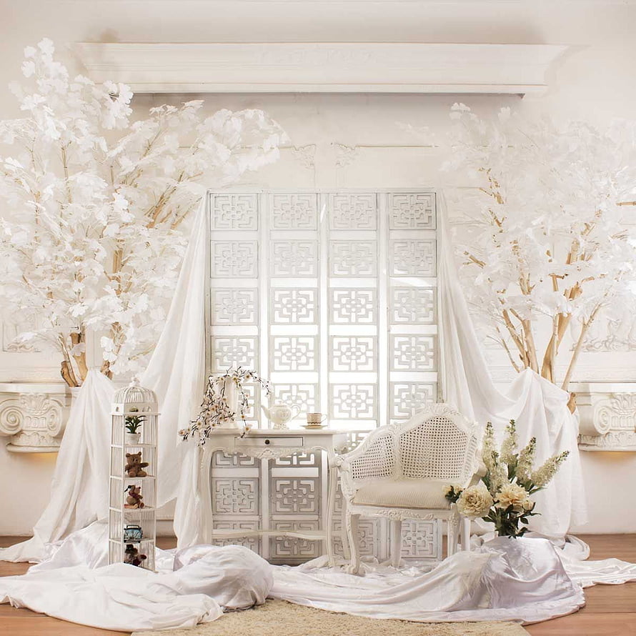 Elegant All-White Wedding Photo Booth Backdrop with Floral Trees and Vintage Furniture HD phone wallpaper