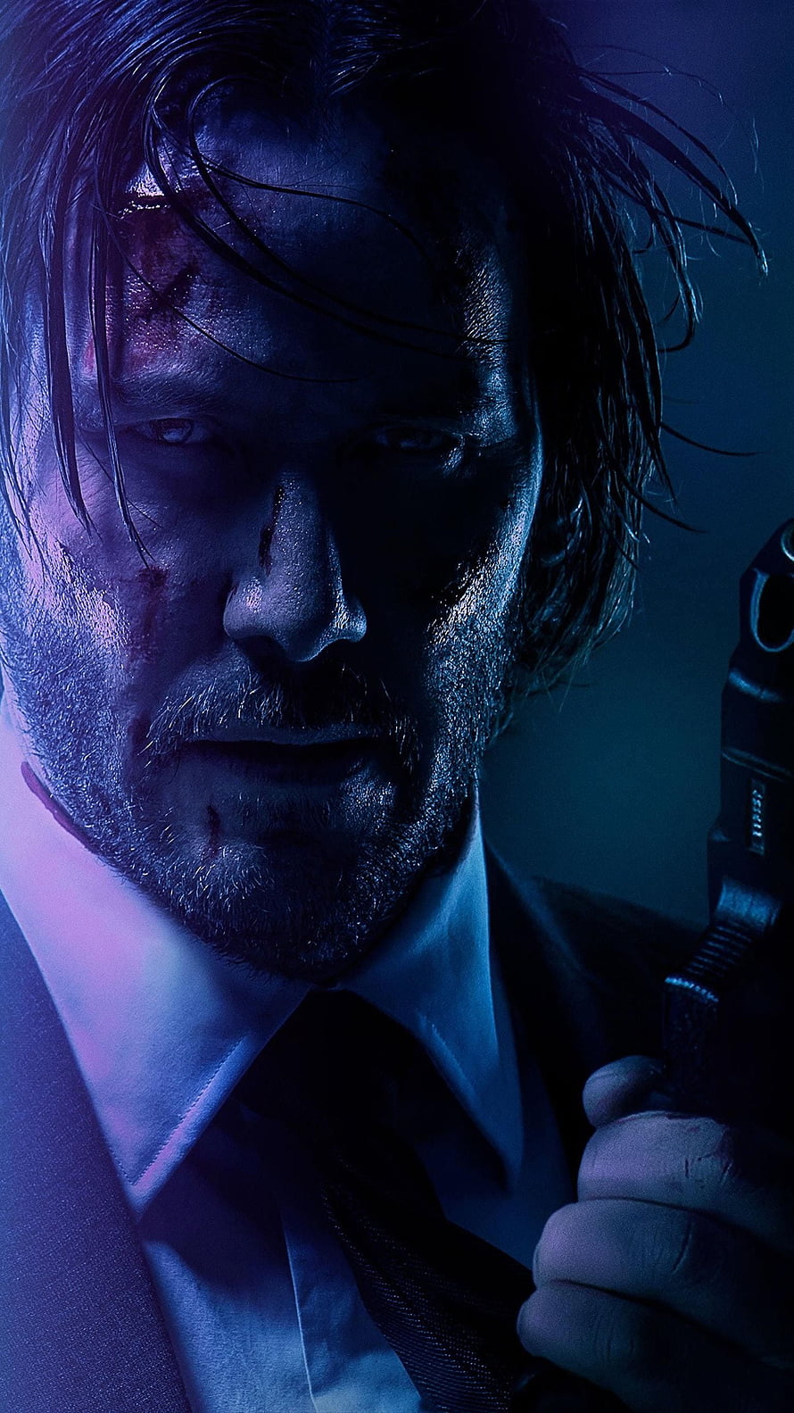 John Wick holding a pistol in a dark suit with blue neon lighting and battle scars HD phone wallpaper
