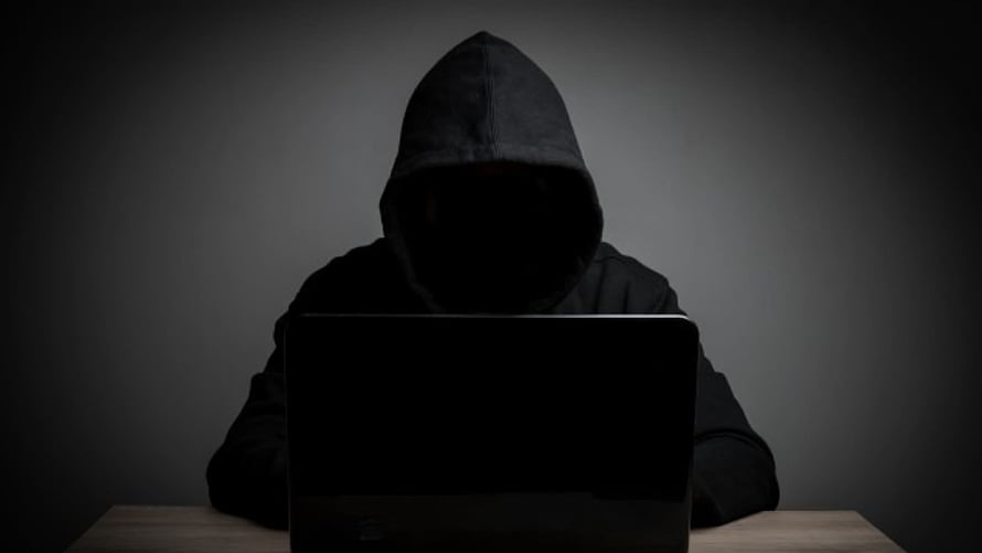 Anonymous Hacker in Black Hoodie Using Laptop in Dark Room HD wallpaper