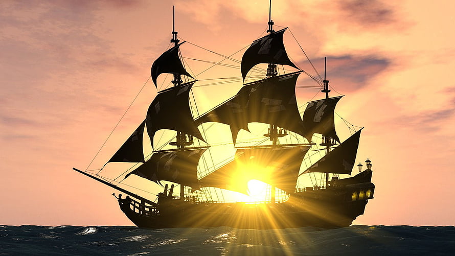 Black Pearl pirate ship silhouette sailing through golden sunset on open ocean HD wallpaper