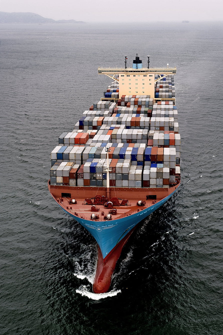 Aerial View of a Massive Maersk Container Ship Loaded with Colorful Shipping Containers on the Open Sea HD phone wallpaper