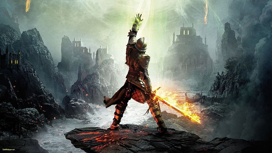Armored Knight Wielding a Blazing Sword on a Volcanic Rock in a Dark Fantasy Landscape HD wallpaper