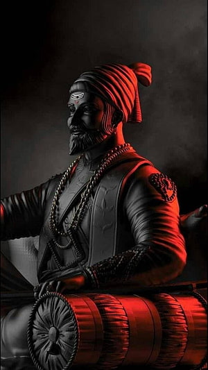 Statue of Dadasaheb Phalke Playing Dholak Drum in Red Lighting HD phone wallpaper