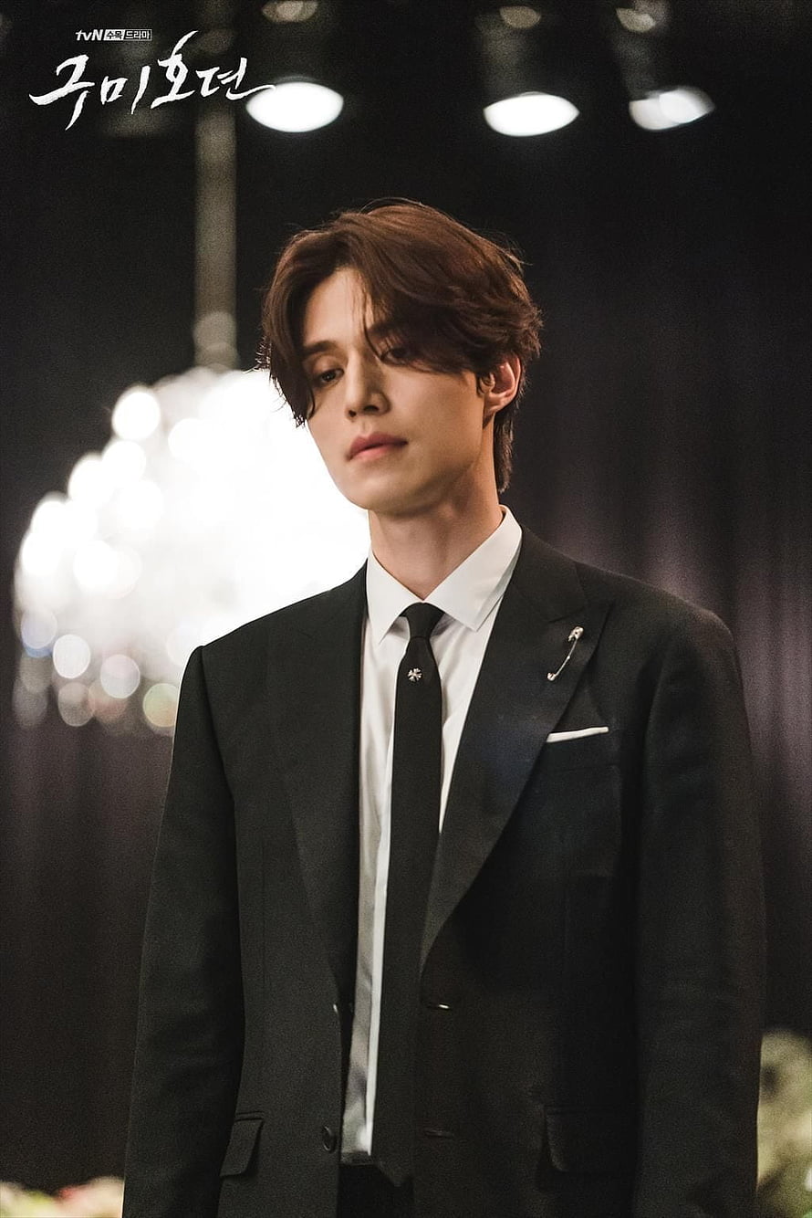 Lee Dong Wook in a formal black suit from the Korean drama Tale of the Nine Tailed HD phone wallpaper