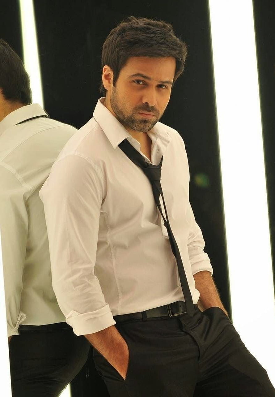Emraan Hashmi in a white dress shirt and loosened black tie posing against a mirror HD phone wallpaper