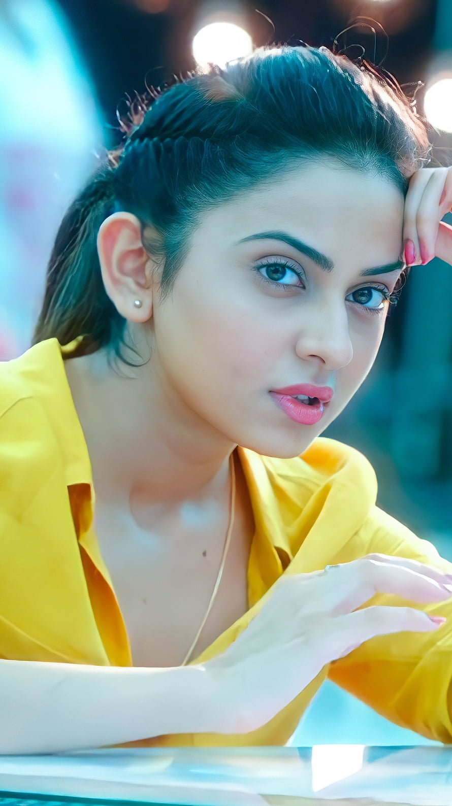Portrait of a woman in a yellow shirt with blue background, Rakul Preet singh, multilingual actress, beautiful HD phone wallpaper
