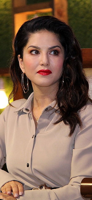 Sunny Leone Portrait in Beige Blouse with Red Lipstick and Gold Hoop Earrings HD phone wallpaper