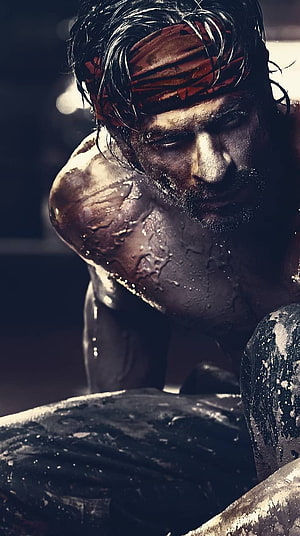 Shah Rukh Khan Intense Portrait with Headband and Sweat HD phone wallpaper