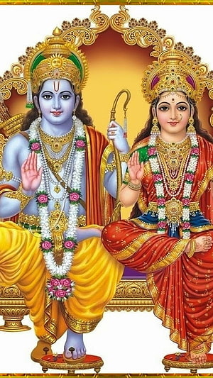 Radha Krishna Divine Couple Sitting Together With Golden Jewelry And Floral Garlands HD phone wallpaper
