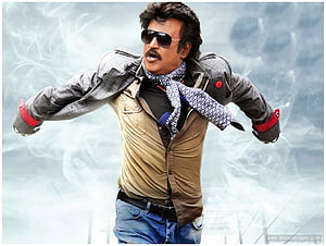 Rajinikanth Action Pose in Sunglasses and Scarf with Dramatic Smoke Background HD wallpaper
