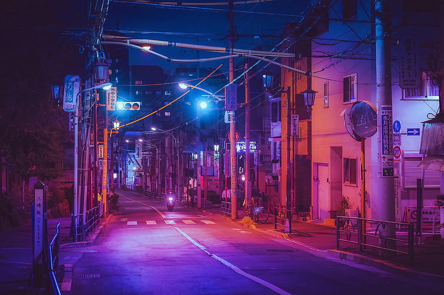 Neon-lit Japanese street at night with purple and blue cinematic lighting HD wallpaper