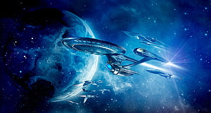 Star Trek Starfleet Ships Flying Past a Blue Planet in Deep Space HD wallpaper