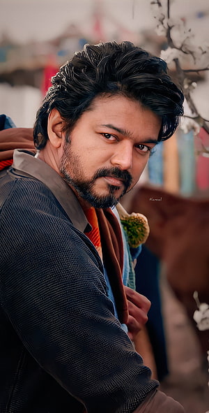 Vijay Sethupathi intense close-up portrait with textured jacket and scarf HD phone wallpaper